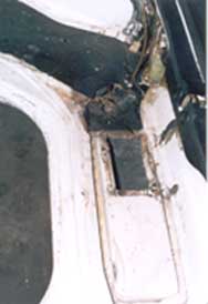 view of rusty battery box